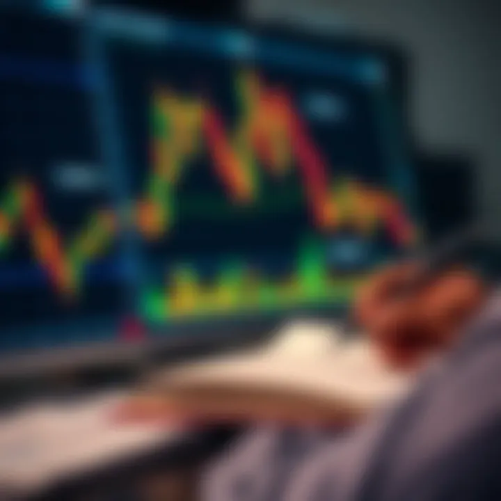 Close-up of a person studying forex trading charts with a notebook and pen for taking notes