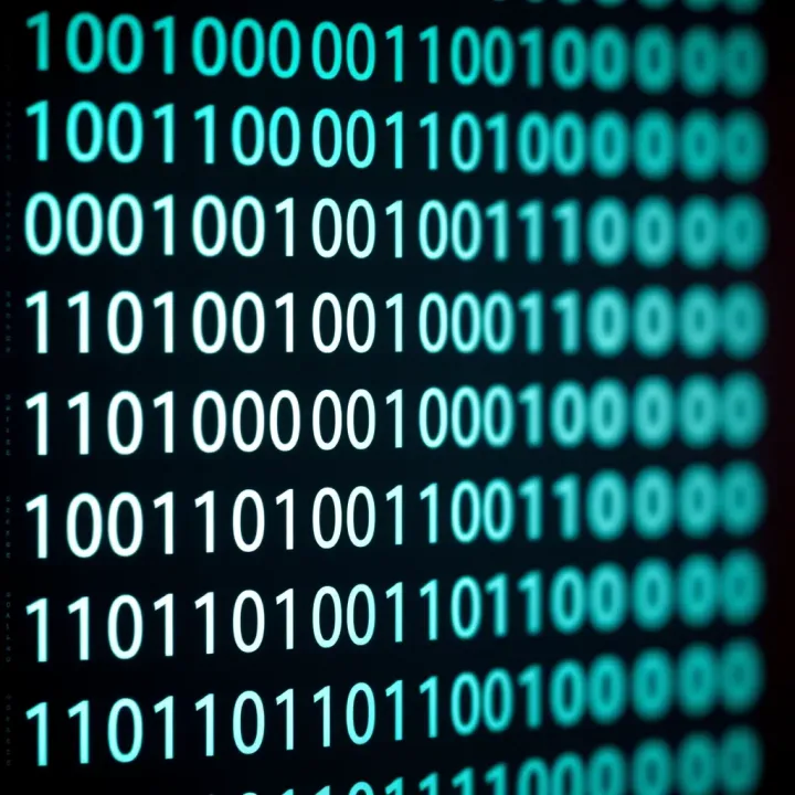 Illustration showing the binary numeral system with digits zero and one arranged in a grid to represent data